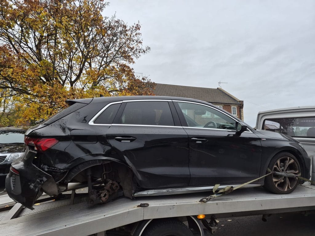 Car waiting for recovery at the roadside